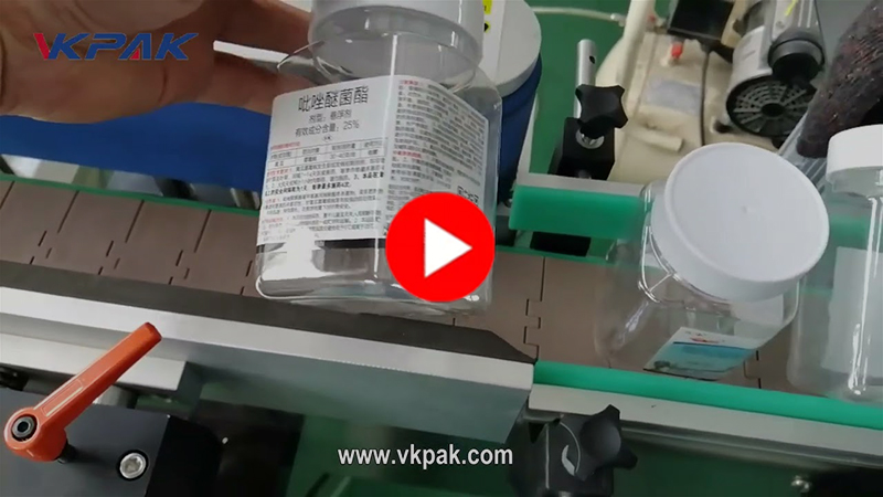 Aparat automat de aplicare a etichetelor pe mai multe fețe pentru sticle pătrate