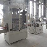 Linie automată de umplere a sticlei cu gât unghiular pentru lichide corozive