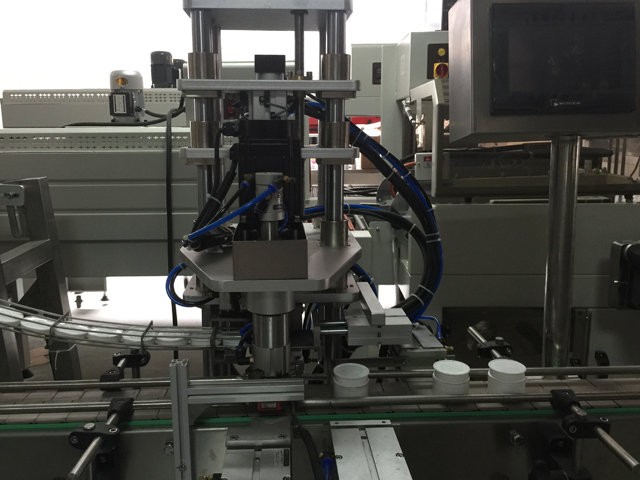 mașină de etanșat borcane.jpg