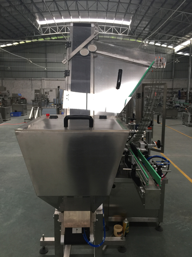 sistem automat de alimentare capace.jpg