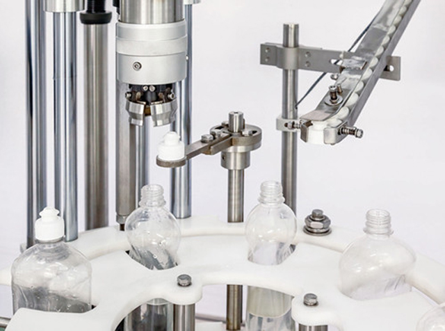 capping head close shot detalii despre o singură mașină de acoperire.jpg