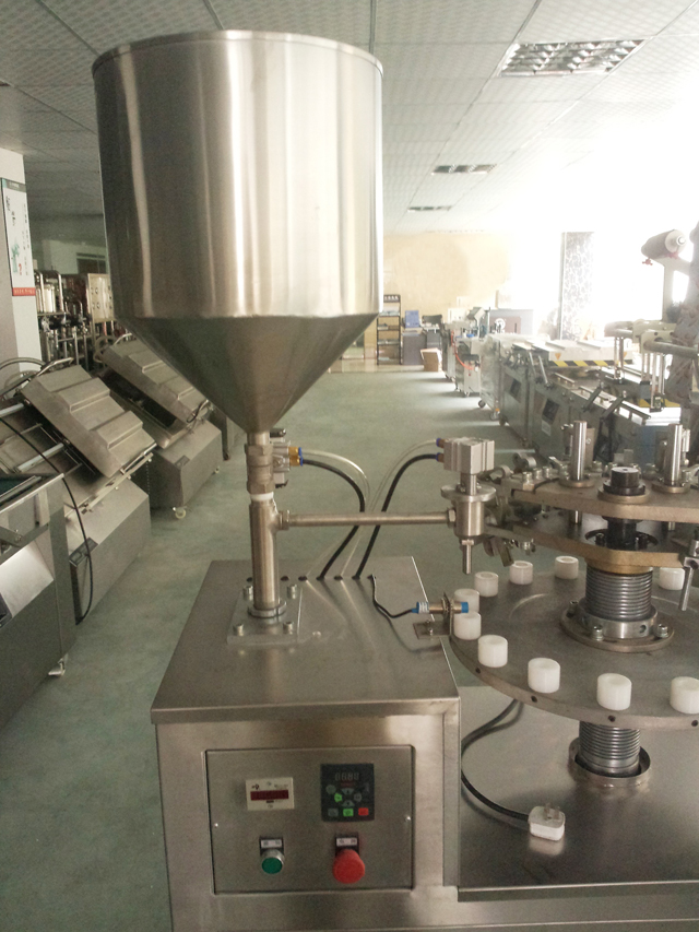metal tubes filling sealing machine in stock tuburi filler sealer hopper.jpg
