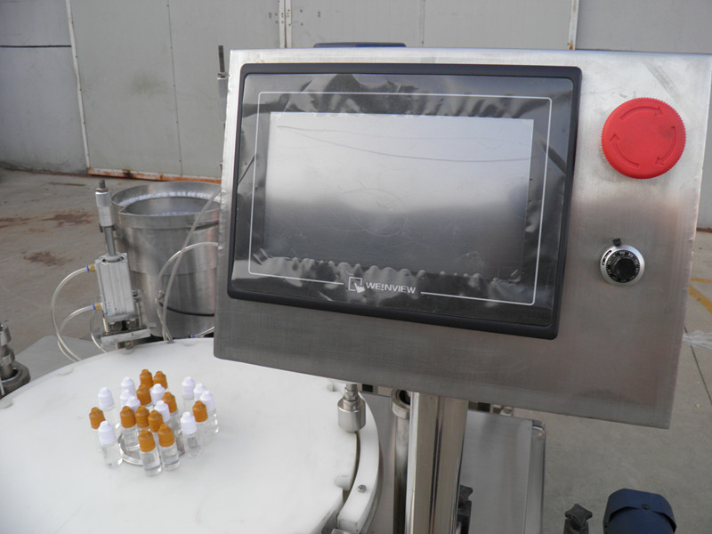 filling plugging capping labeling production line E lichid PLC sticle de umplere capping labeling.jpg