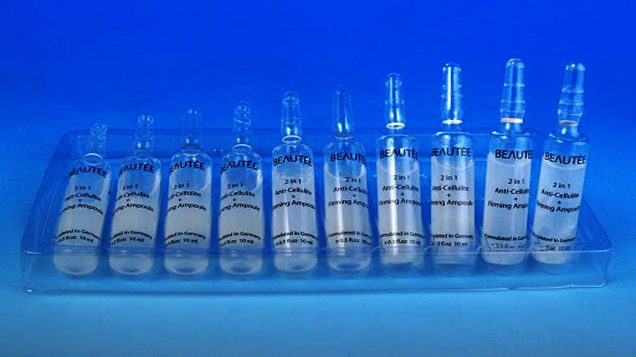 liquid solution bottles labeling machine samples final products sticle fiole.jpg