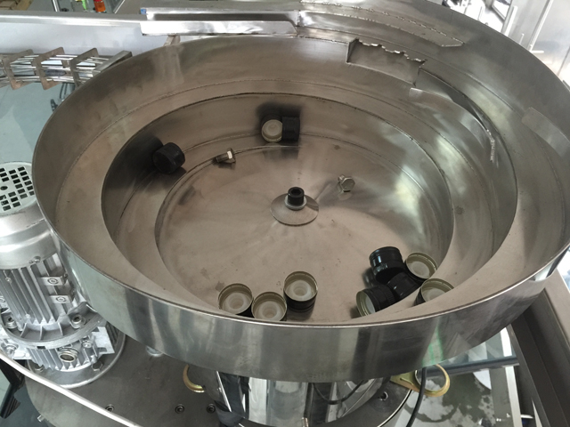 sistem de alimentare cu vibrator capace.jpg