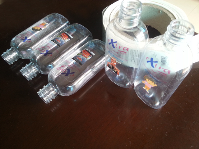 transparent labels labelled samples bottles plane surface Mrwan mostre etichete transparente și sticle (3).jpg